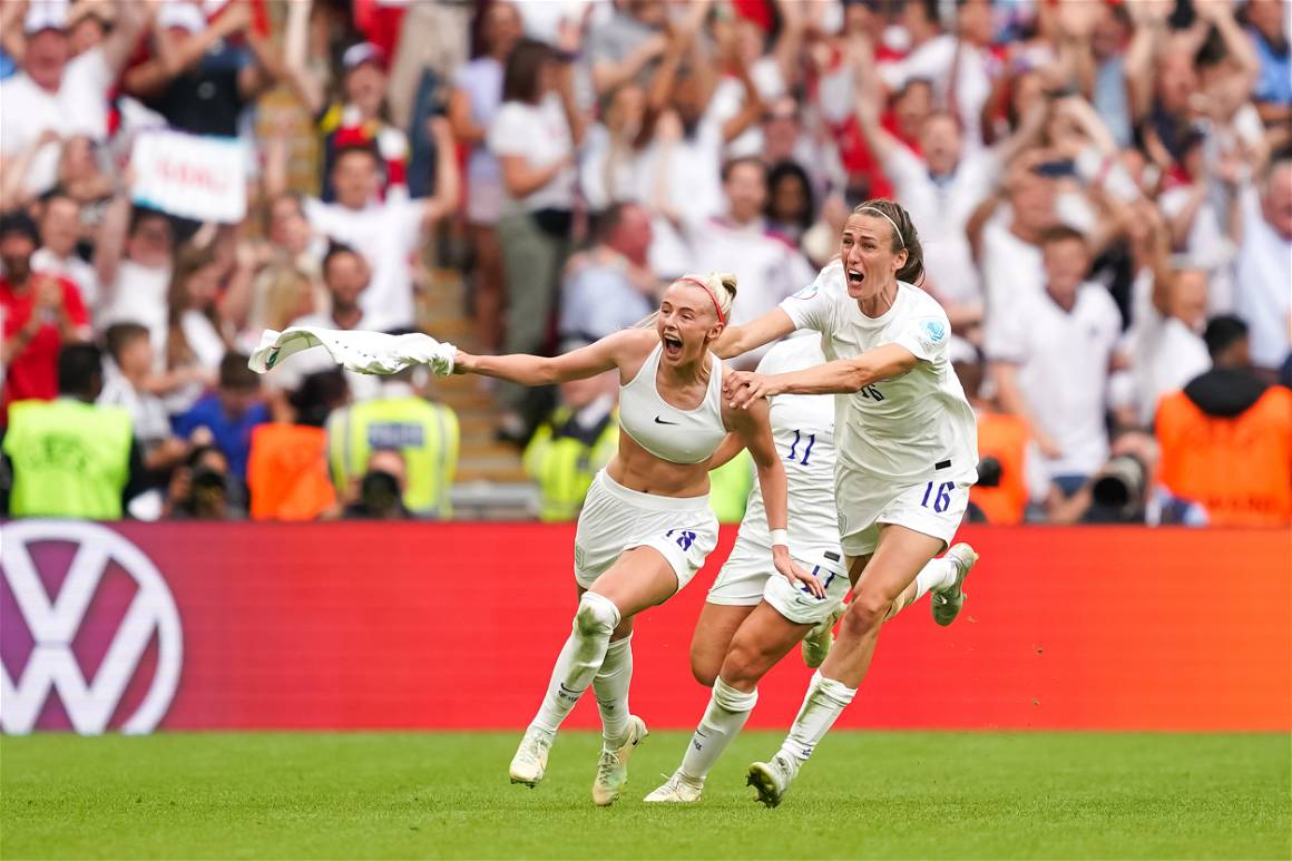 Chloe Kelly #18 of England celebrates after scoring her team's second goal with teammates