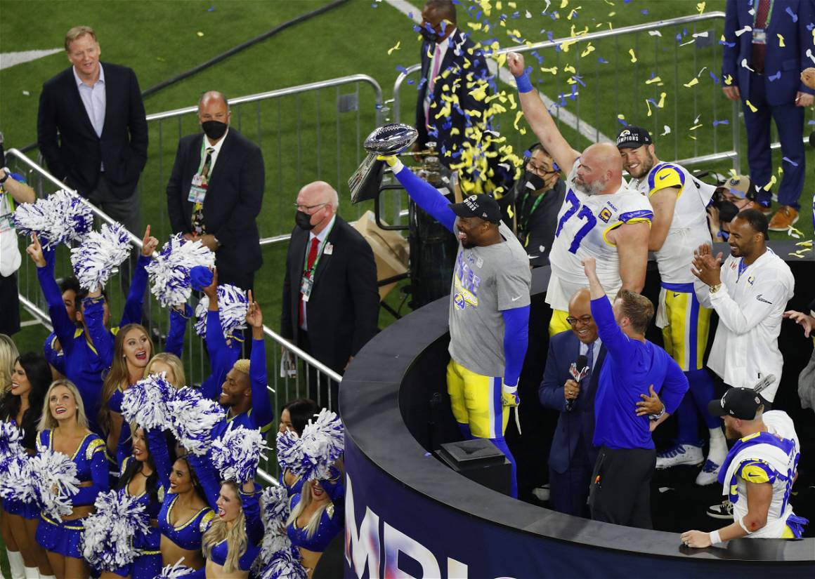 IMAGO / ZUMA Wire / K.C. Alfred | Los Angeles Rams Von Miller holds up the Vince Lombard trophy after winning the Super Bowl LVI. February 13, 2022.