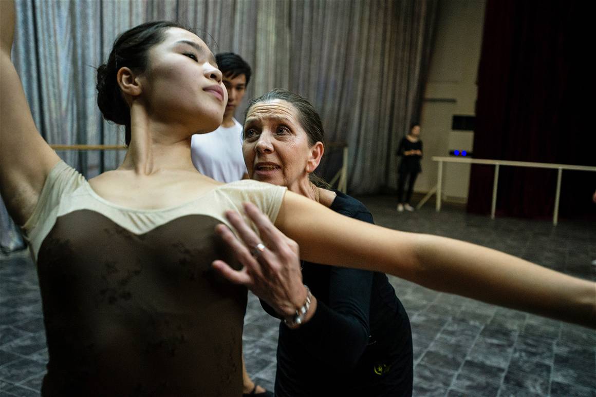 Teacher Aksenova Irina Sergeevna trains ballerina during rehears