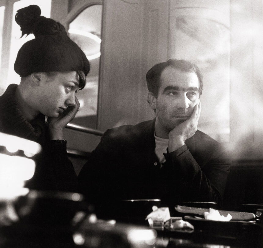 Black and white photo of artists Niki de Saint Phalle and Jean Tinguely in Paris, 1960.