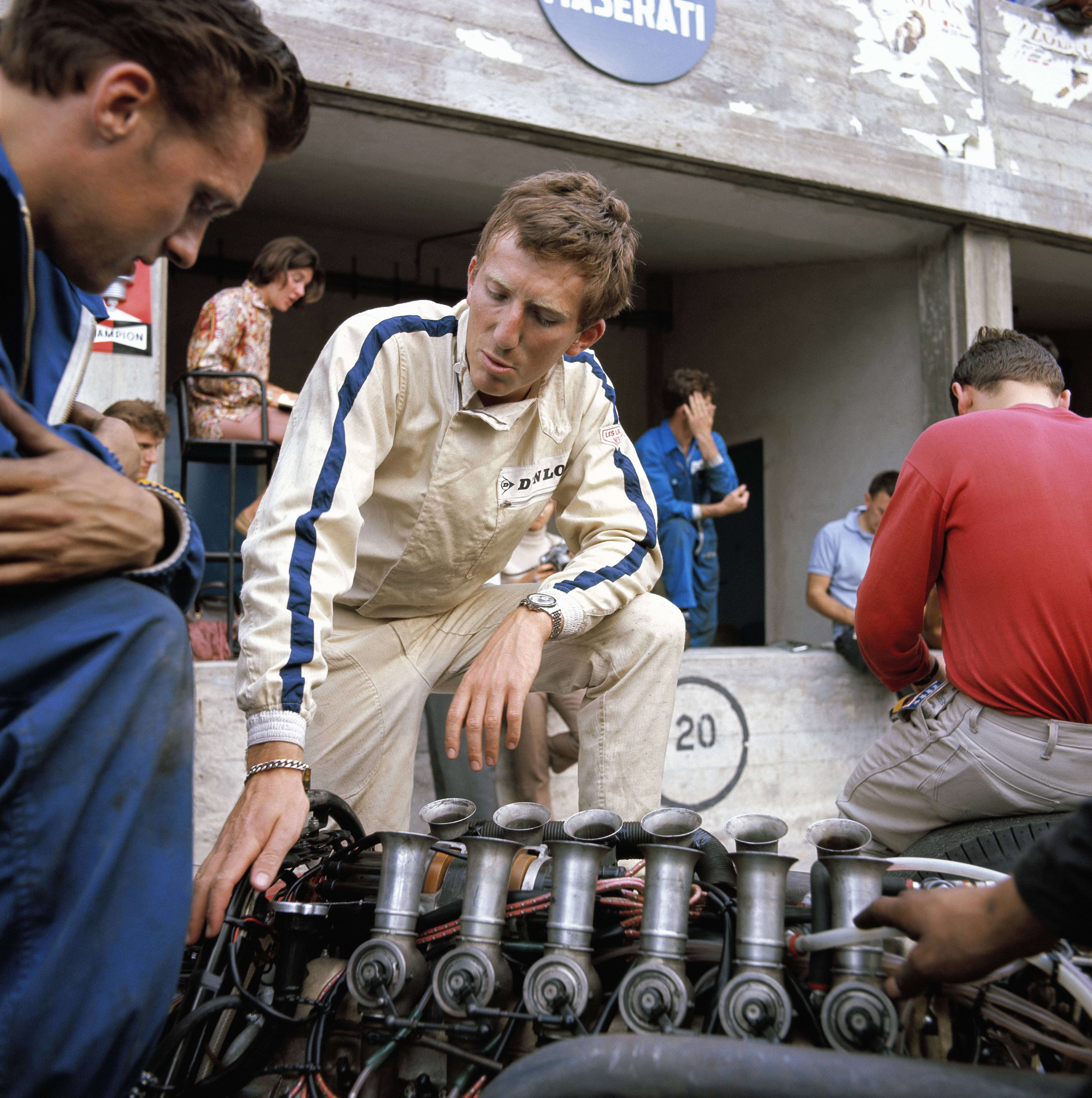 IMAGO / Motorsport Images / Rainer Schlegelmilch | Jochen Rindt beside the Maserati V12 engine of his Cooper T86 during the Italian GP at Autodromo Nazionale Monza. 10 September, 1967.