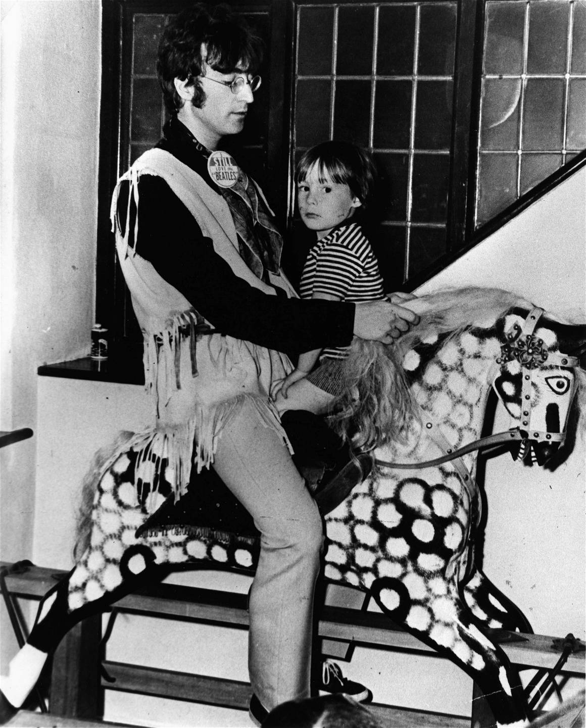 JOHN LENNON (1940-1980) member of The Beatles with his son JULIAN
