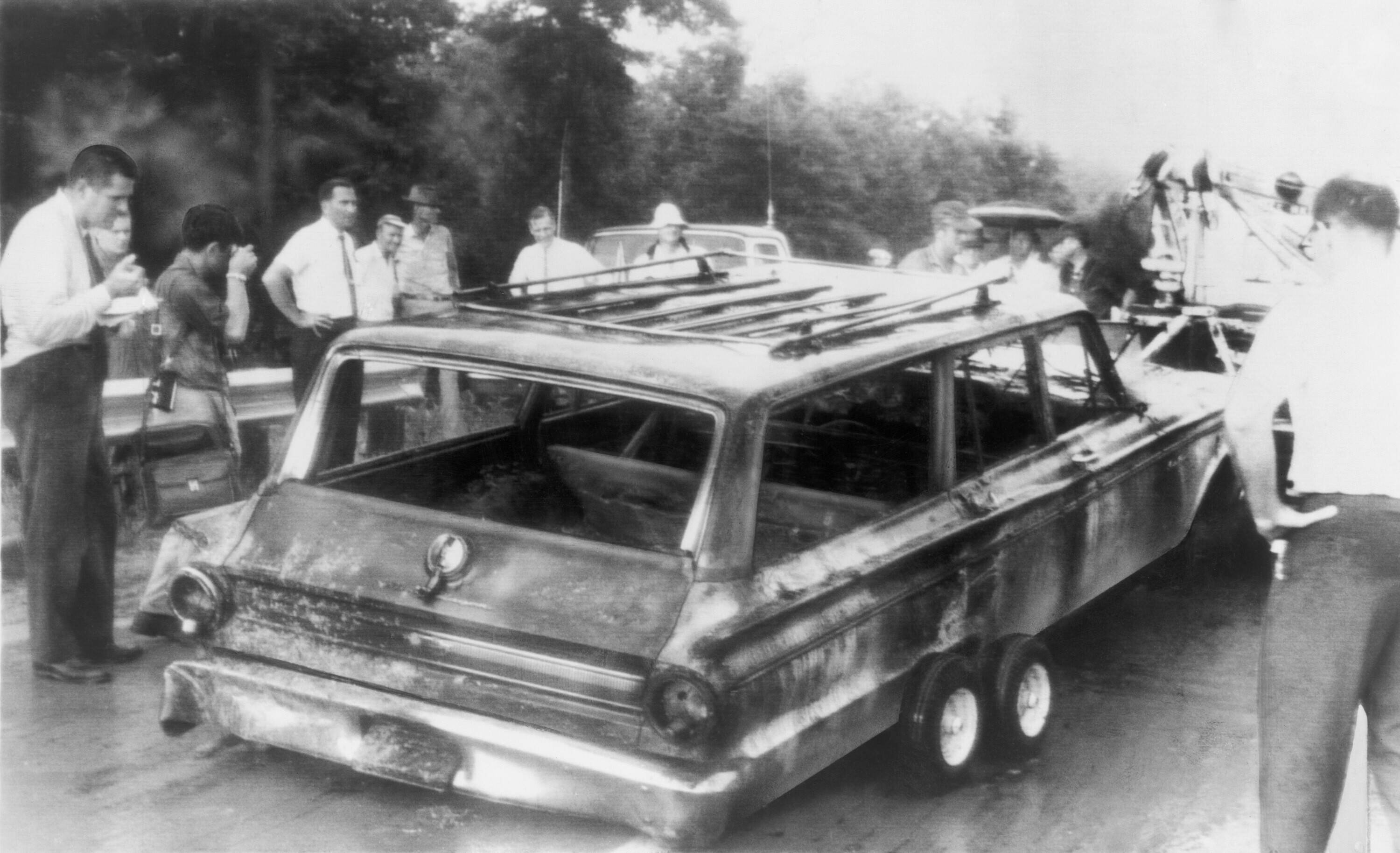 IMAGO / Everett Collection | Charred remains of station wagon driven by murdered civil rights workers, James Chaney, Michael Schwerner, and Andrew Goodman was found in June 1964 during the Freedom Summer.