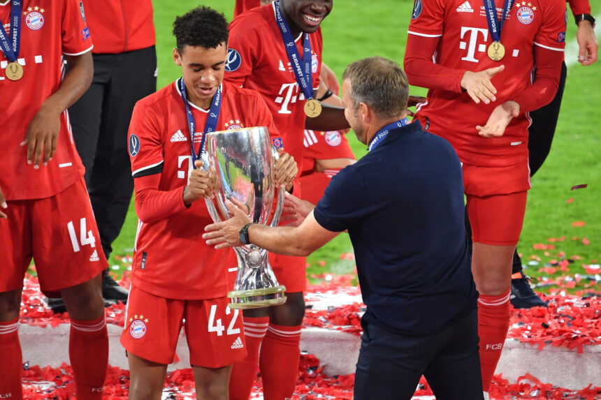 head coach Hansi Flick of FC Bayern München and Musiala